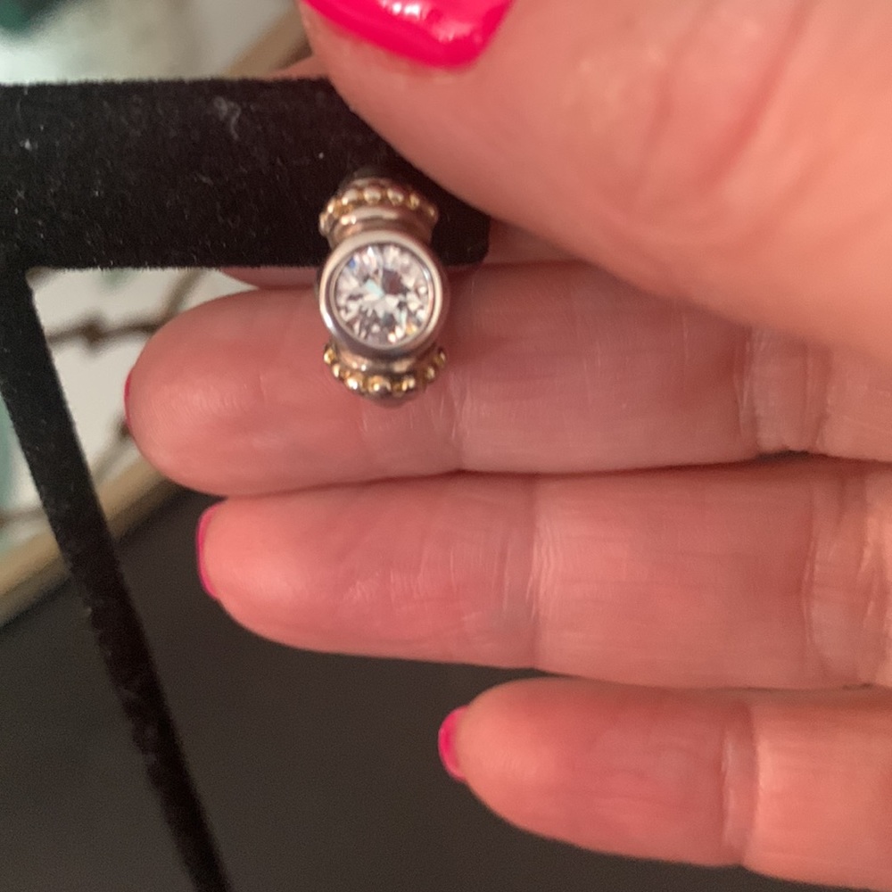 Silver huggy earrings. Center bezel  clear stone with Gold beading surround. - Picture 3 of 6